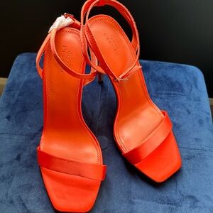 ASOS DESIGN Wide Fit barely there heeled sandals in orange.
